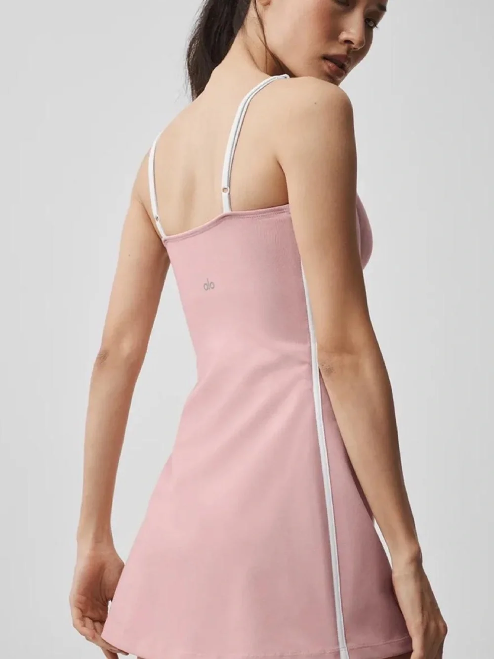 Alo Yoga Airbrush Streamlined Mini Dress in Pink Quartz/White.